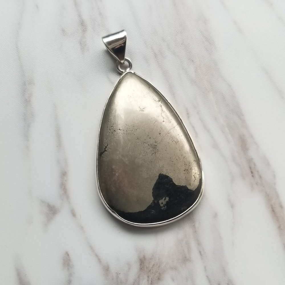 Sterling Silver Smooth Teardrop Shape Ston…